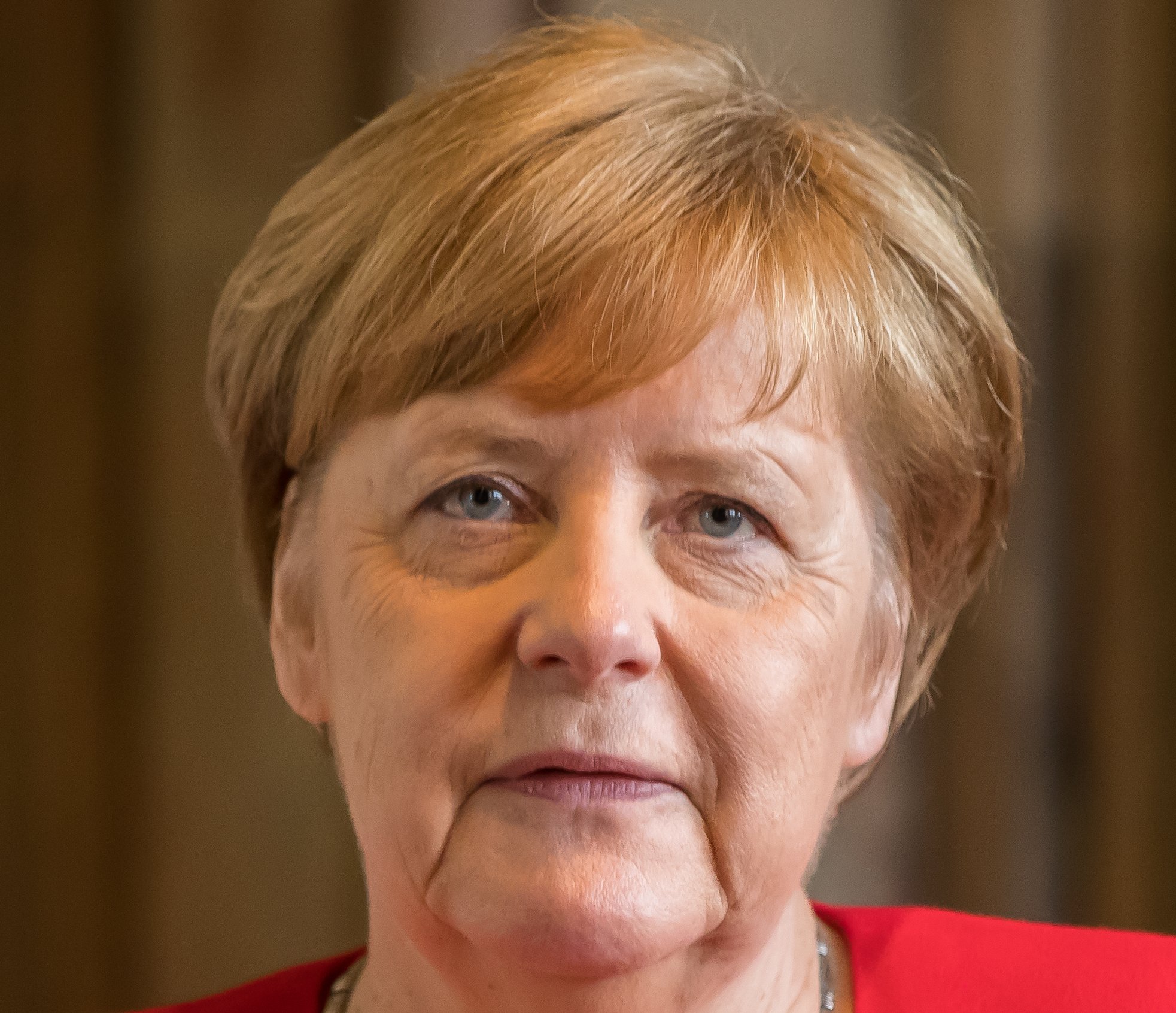 Portrait Photo of Angela Merkel in red outfit