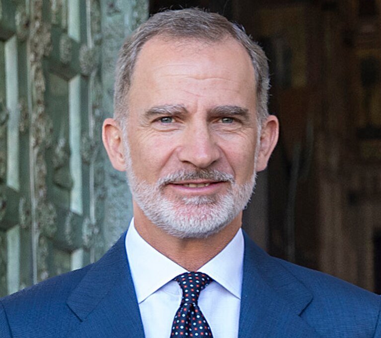 Portrait Photo of Felipe VI King of Spain in a blue suit