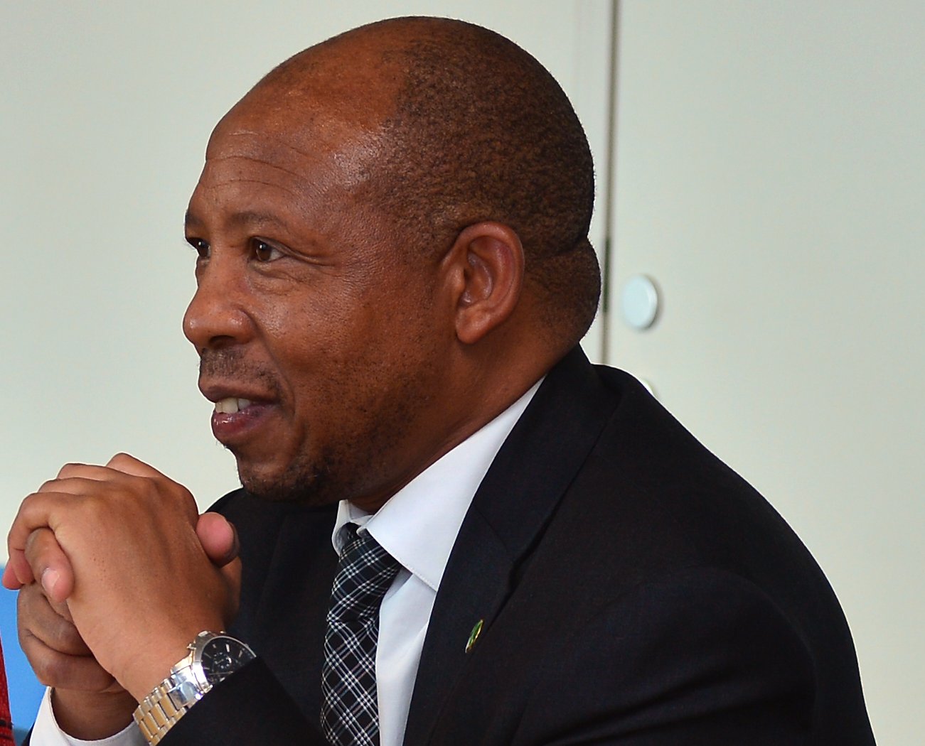 Portrait Photo of Moeketsi Majoro in dark suit