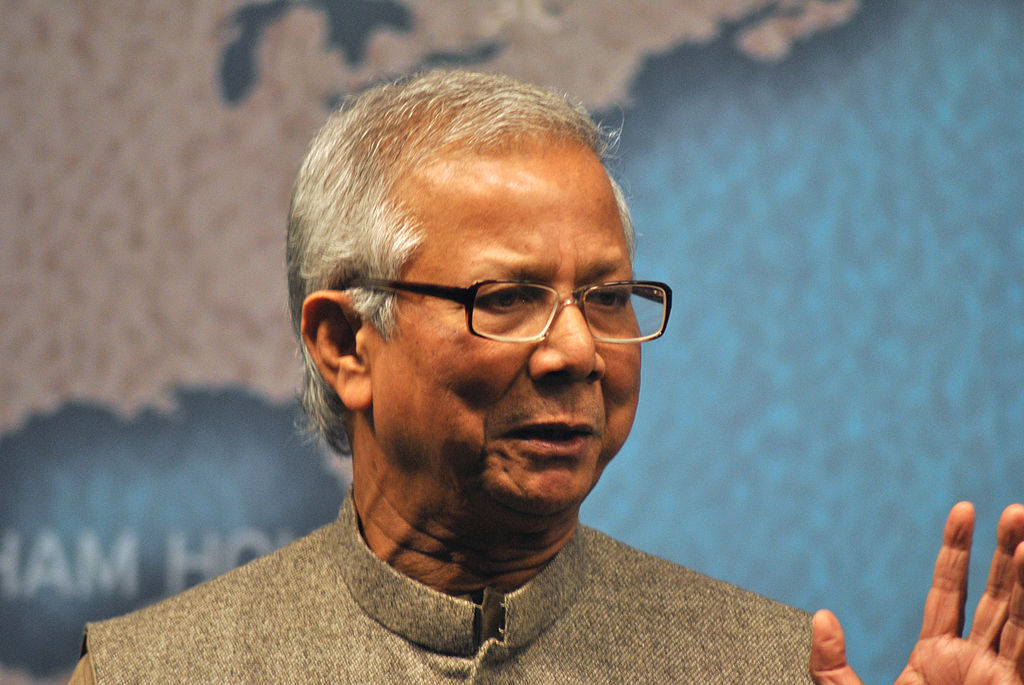 Portrait Photo of Muhammad Yunus in gray outfit