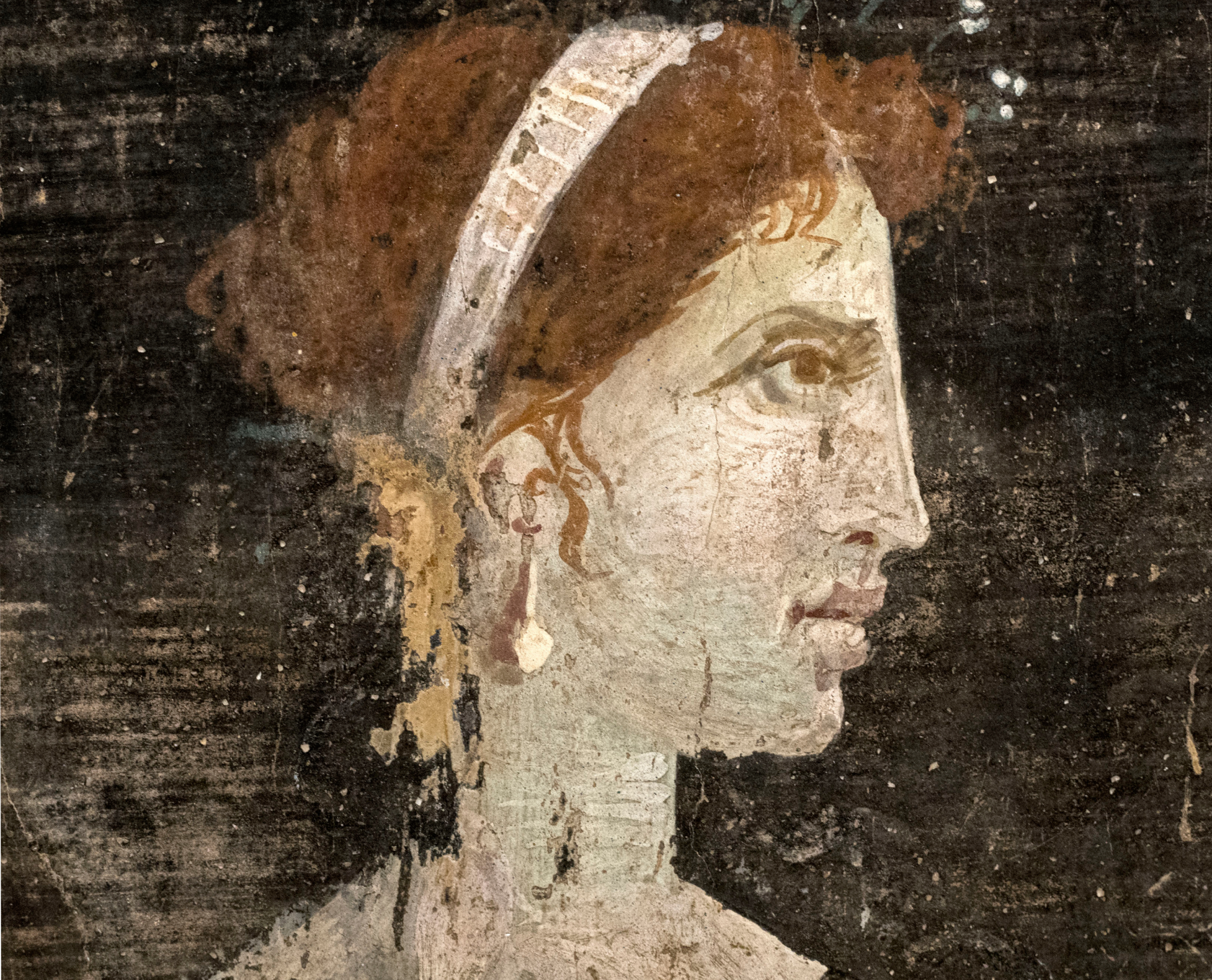 Most likely a posthumously painted portrait of Cleopatra with red hair