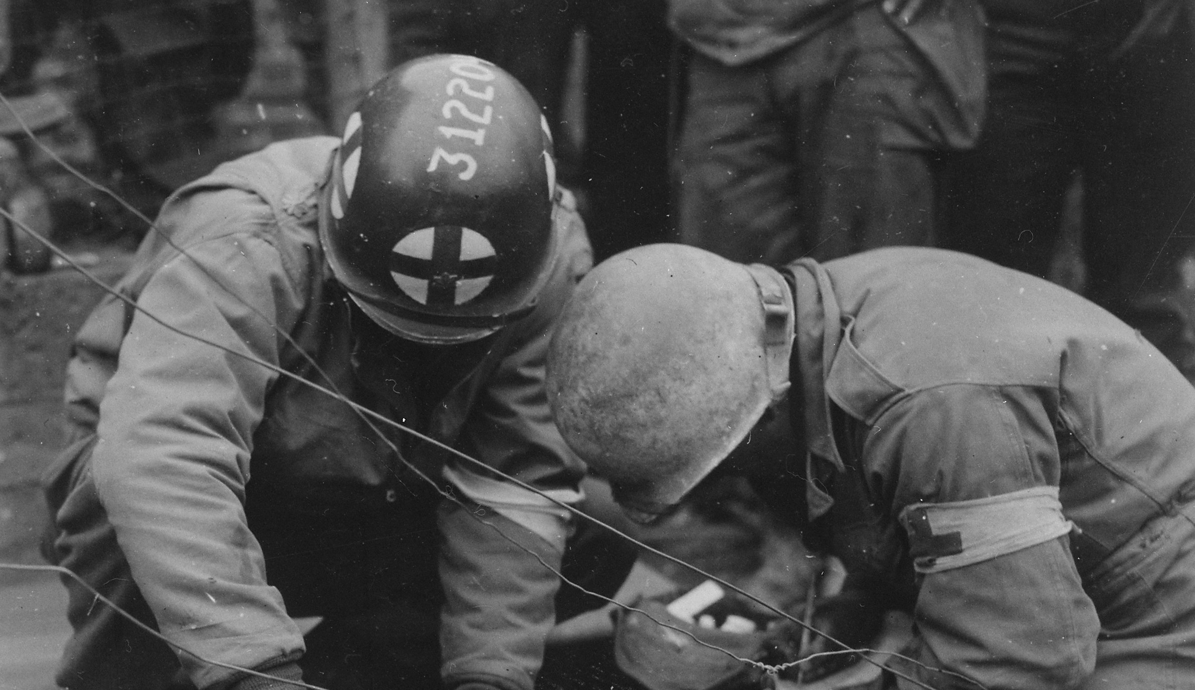 Americans soldiers giving medical aid