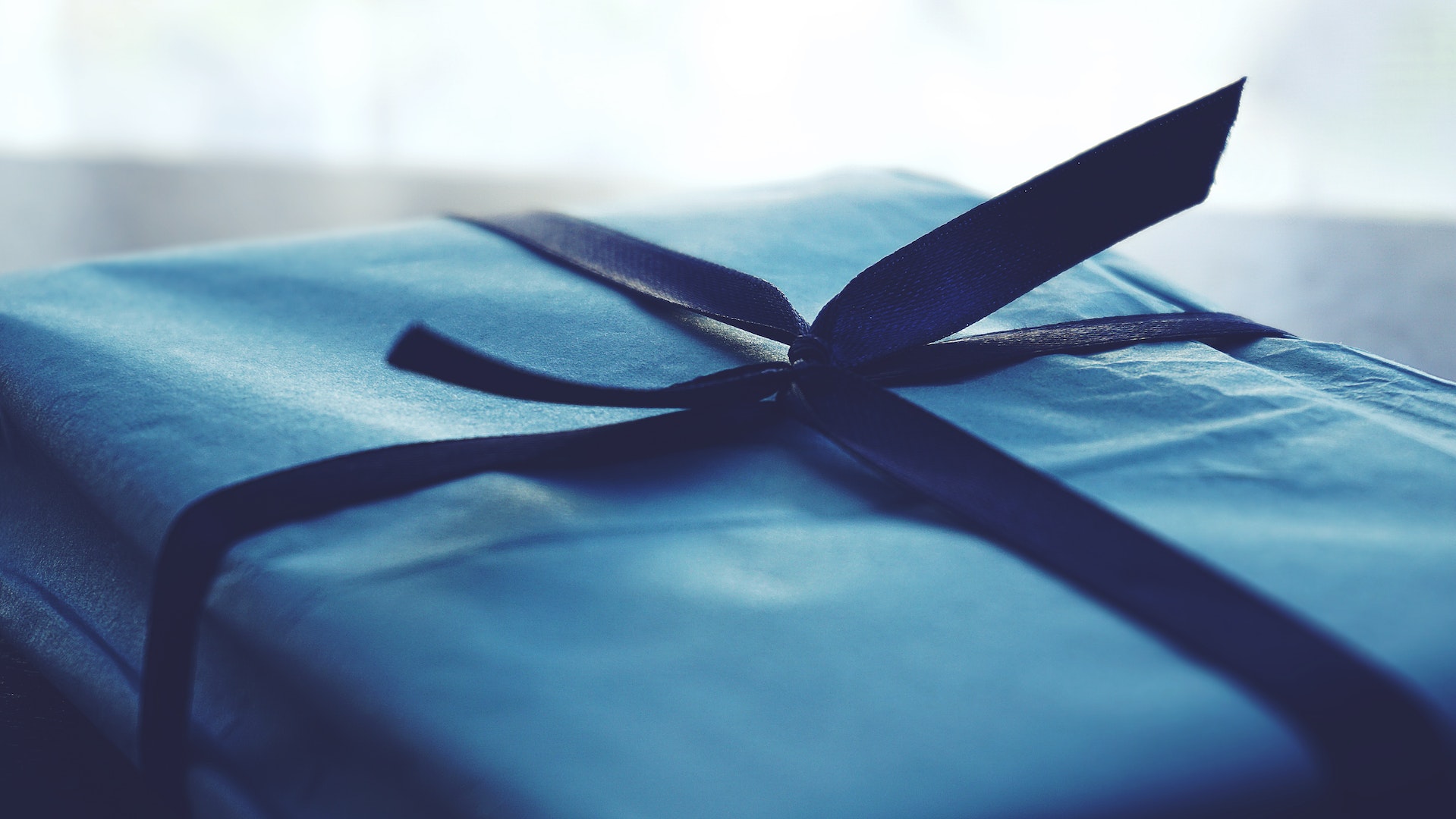 Gift wrapped in blue paper