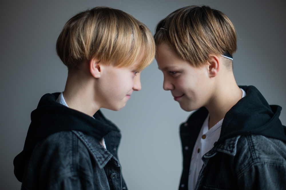 twin boys in denim jackets