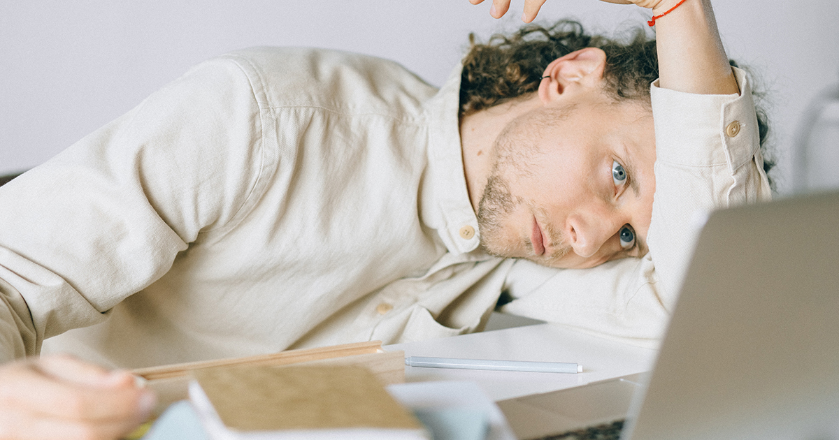 Man overwhelmed at his job