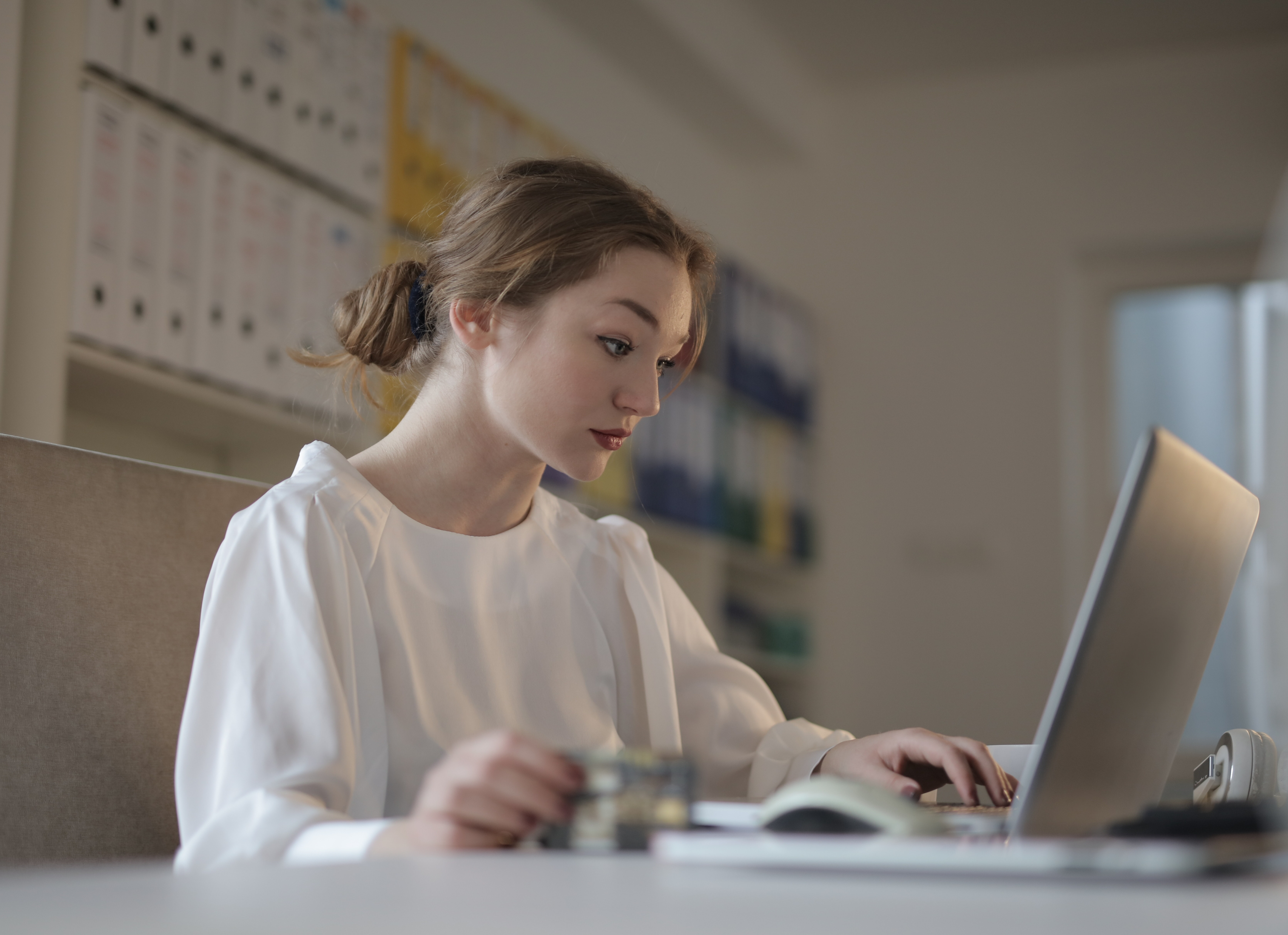A woman working on a laptop