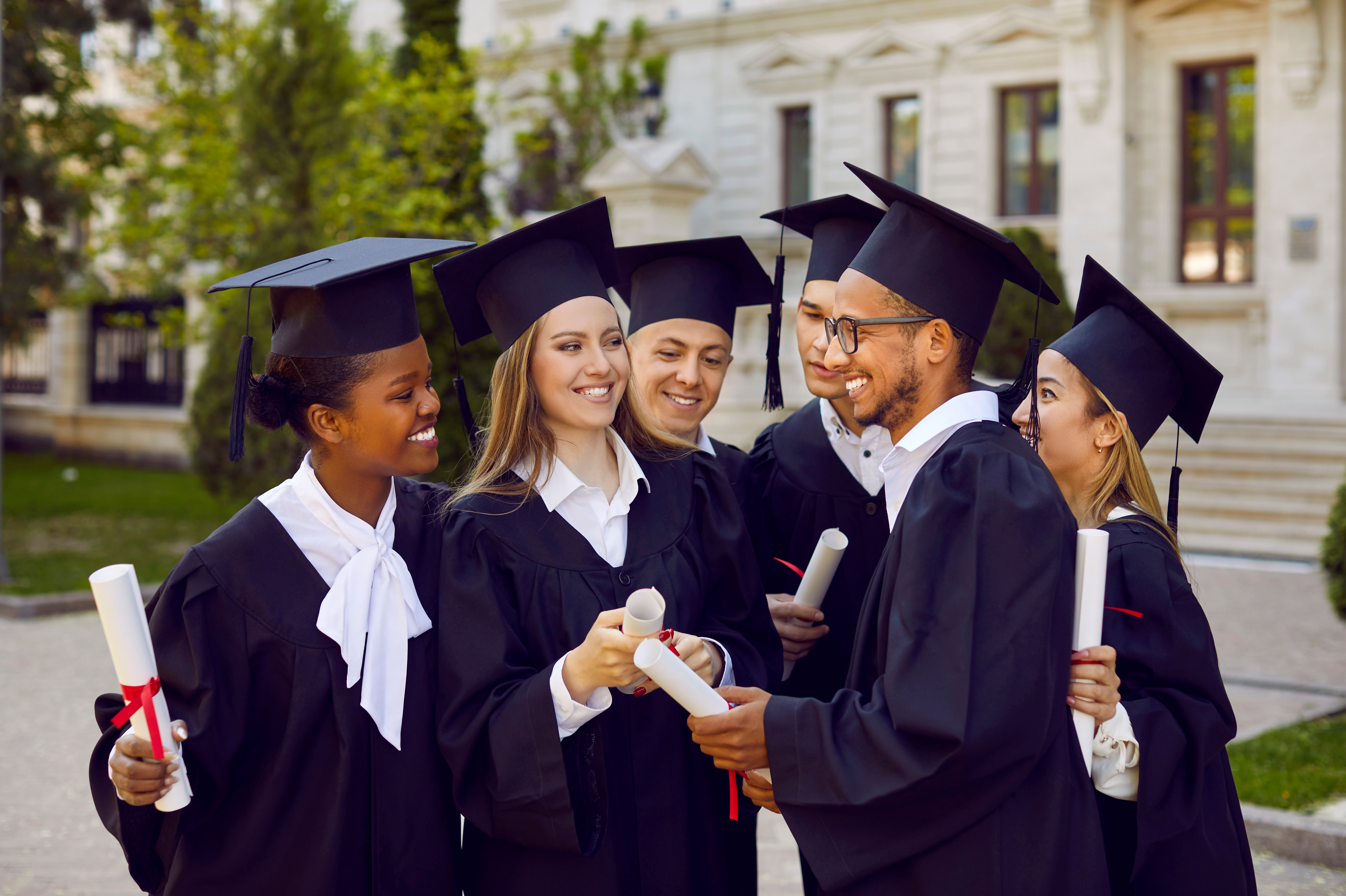 Students in caps and gowns at graduation