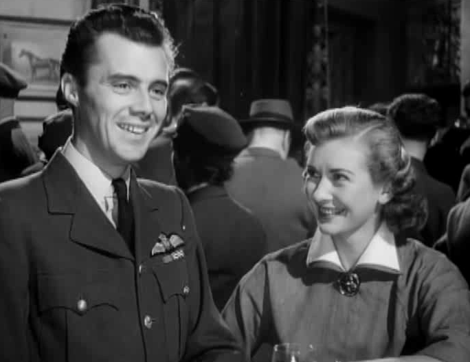 Dirk Bogarde wearing an army uniform