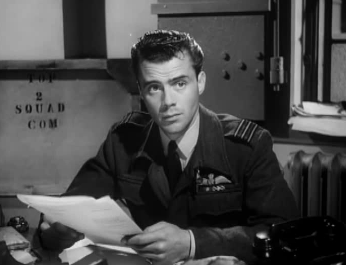Dirk Bogarde wearing a uniform