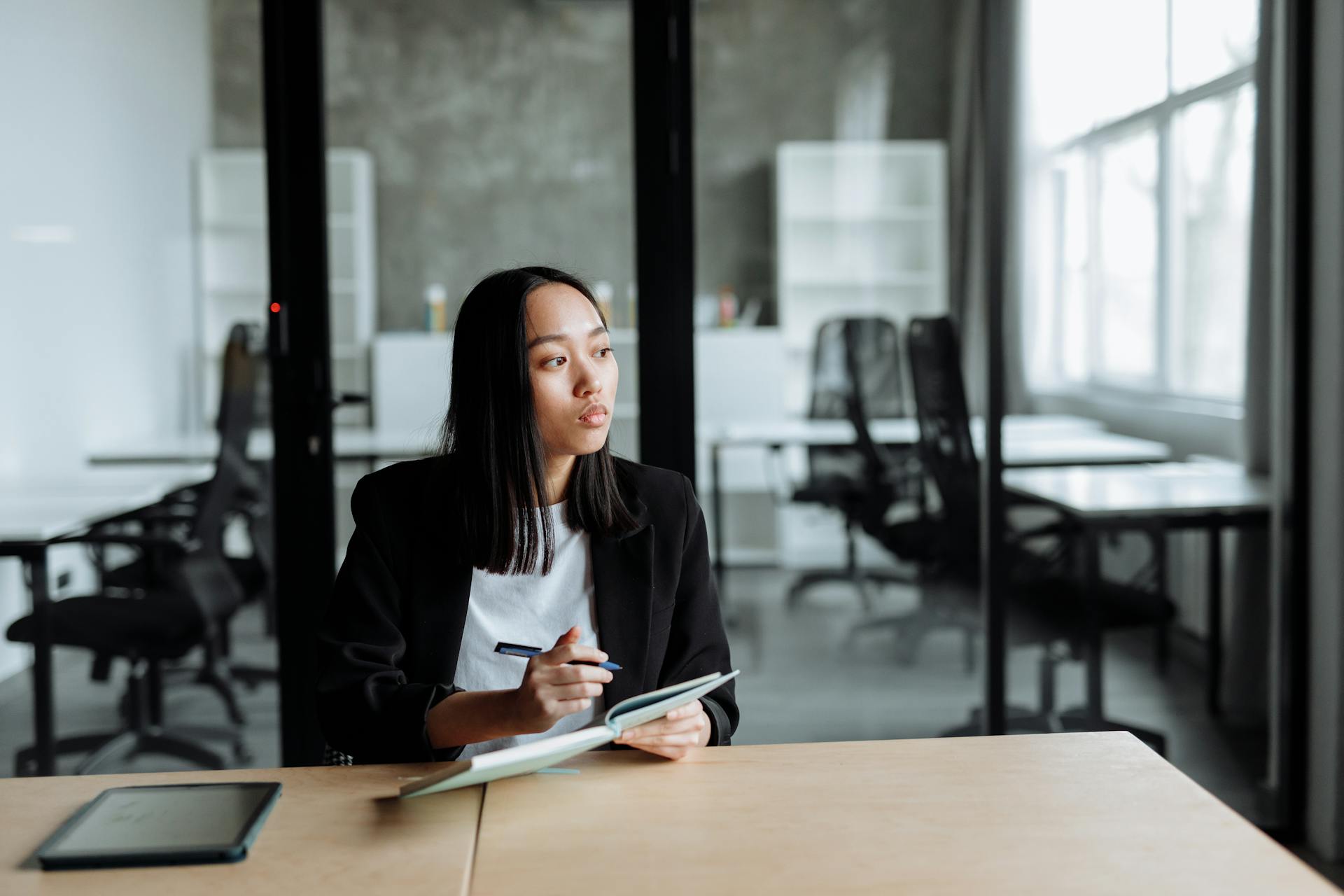 Woman writing on a papers