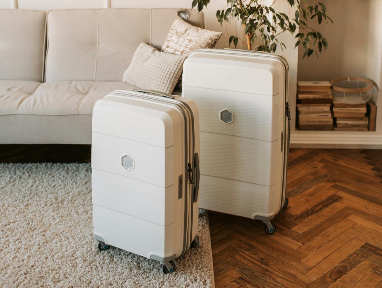 White suitcases in two sizes