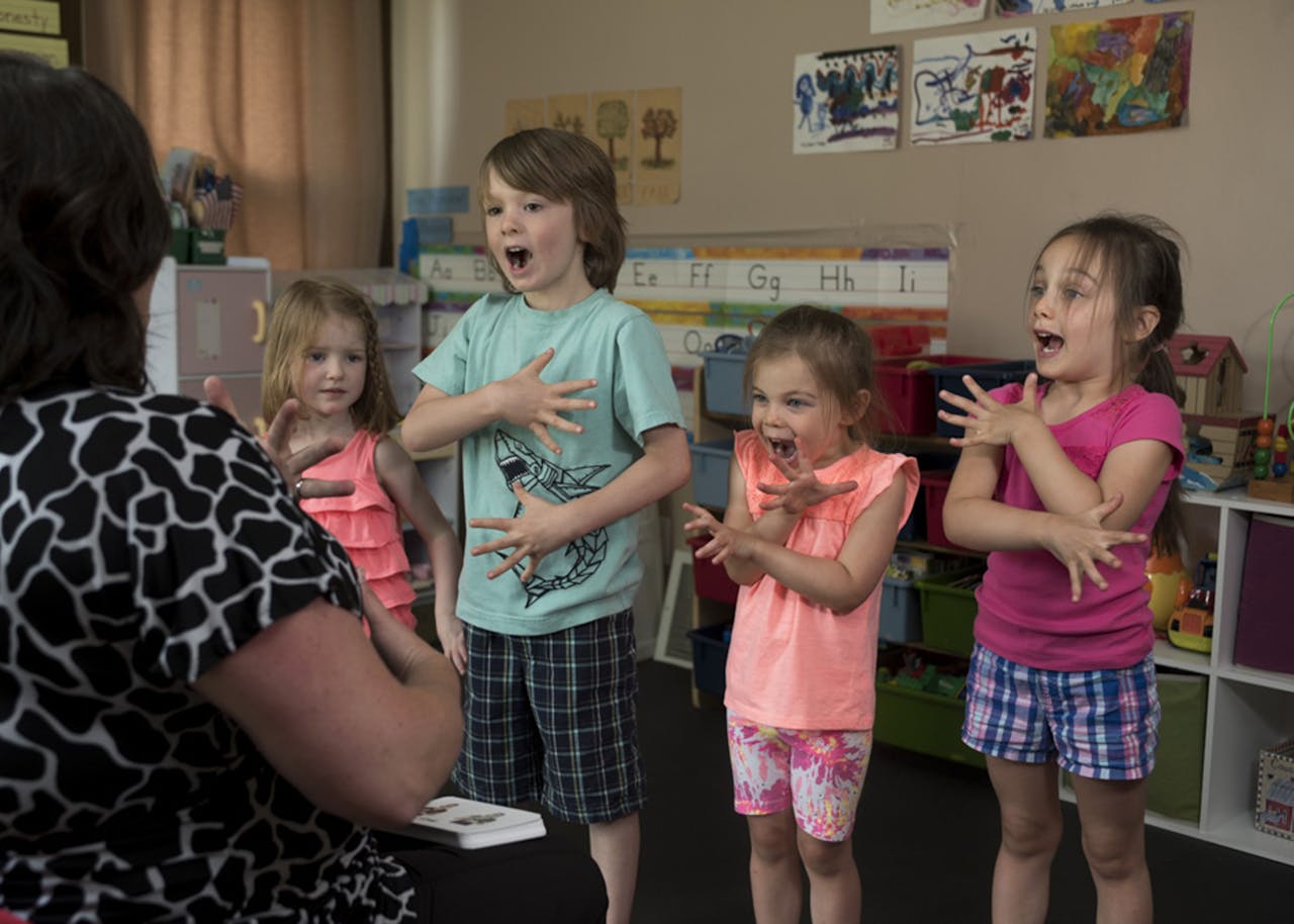 Kids Performing in Front of a Teacher Inside Classroom