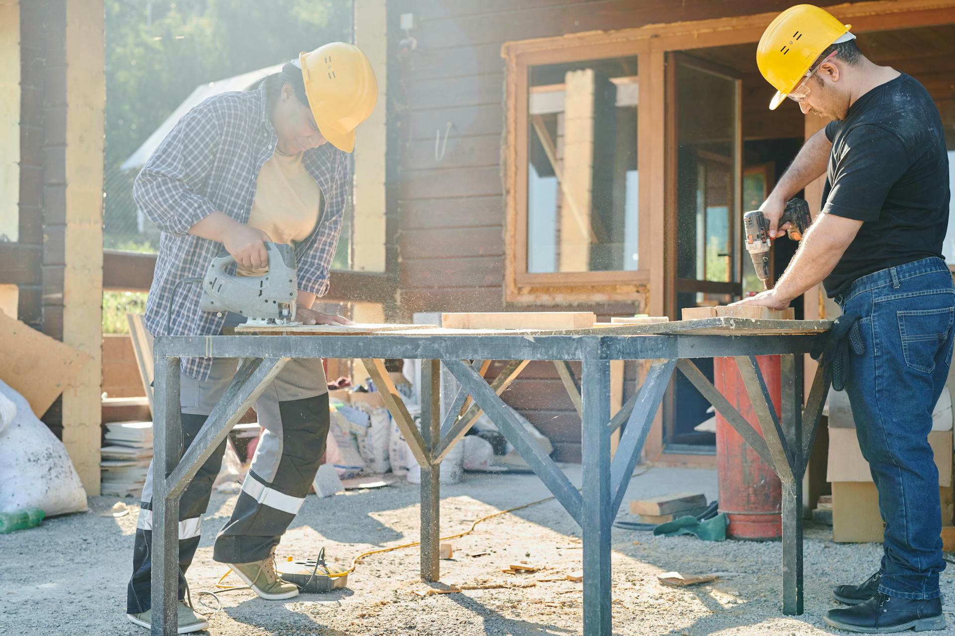 People Working Using Industrial Tools