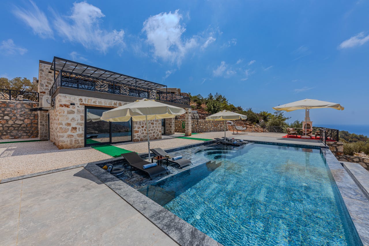 A pool in the middle of the yard.