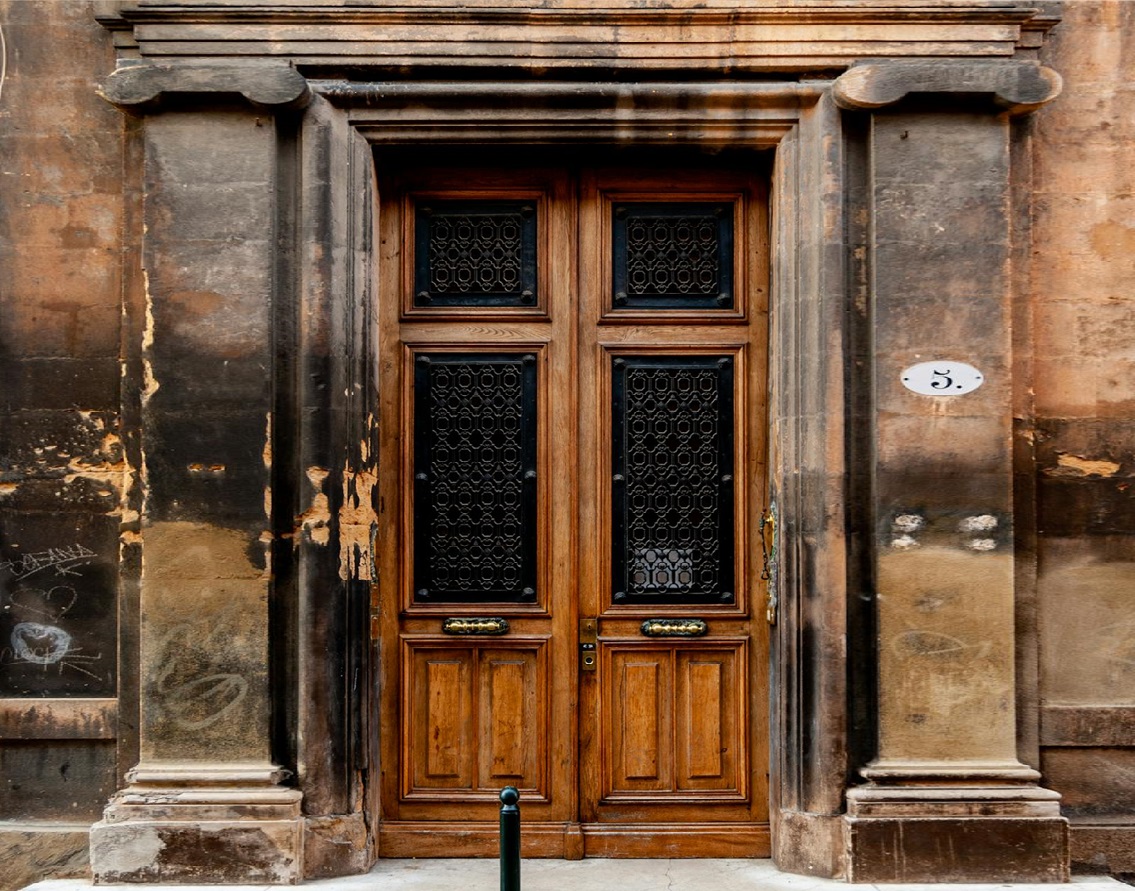 Brown Wooden Door Entrance of an Old Building
