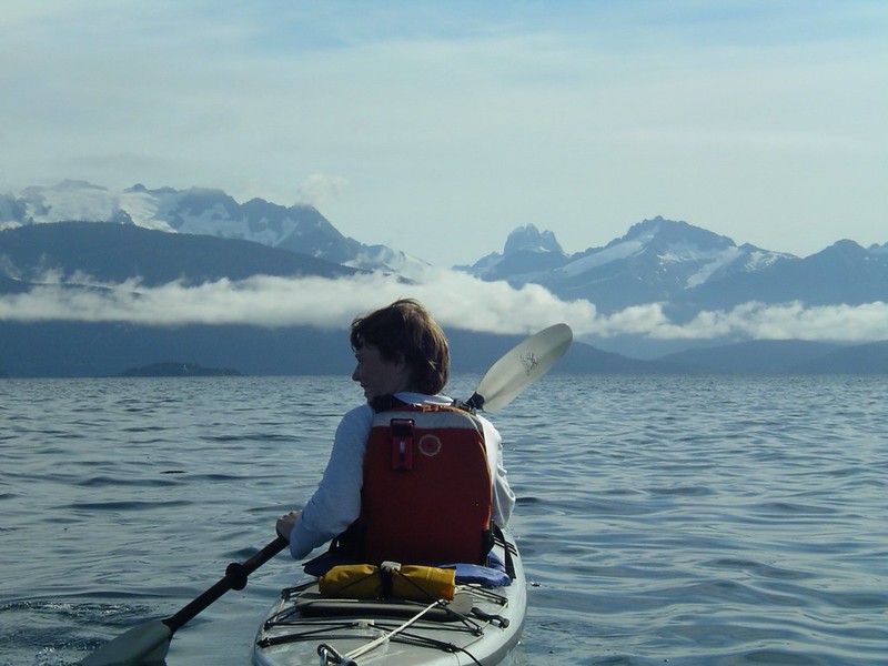 Woman kayaking on the lake