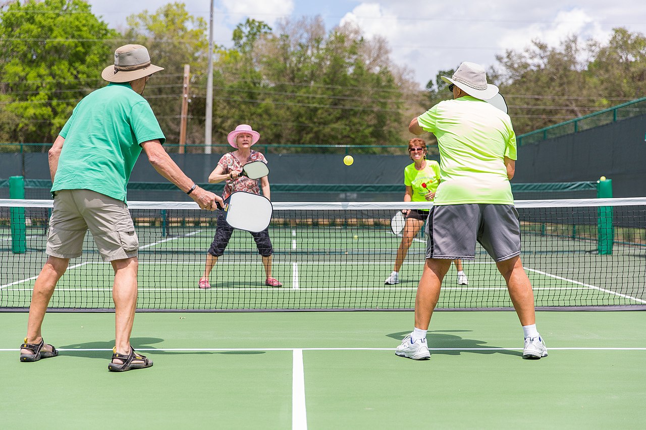 Photo of a group of pickleball players
