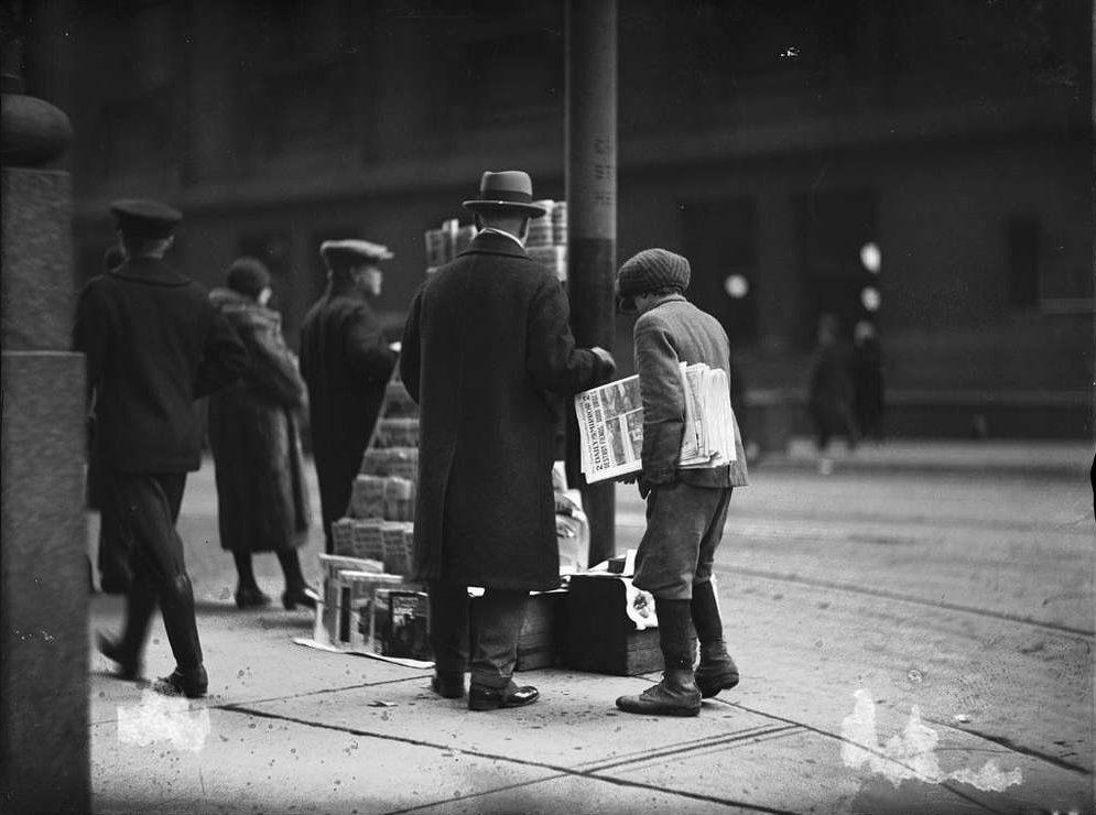 Selling newspaper in 1900s