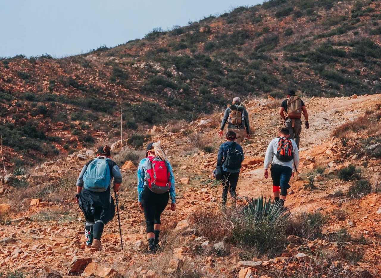 A group of people with backpacks