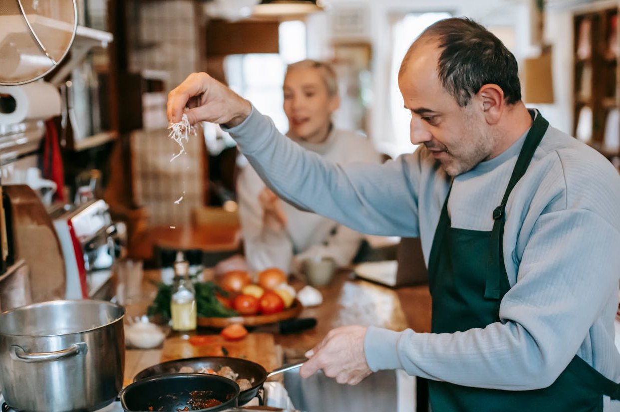 Man preparing food on the stove