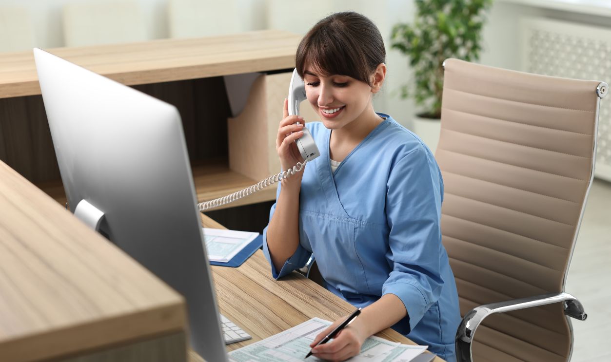 smiling-medical-assistant-talking-