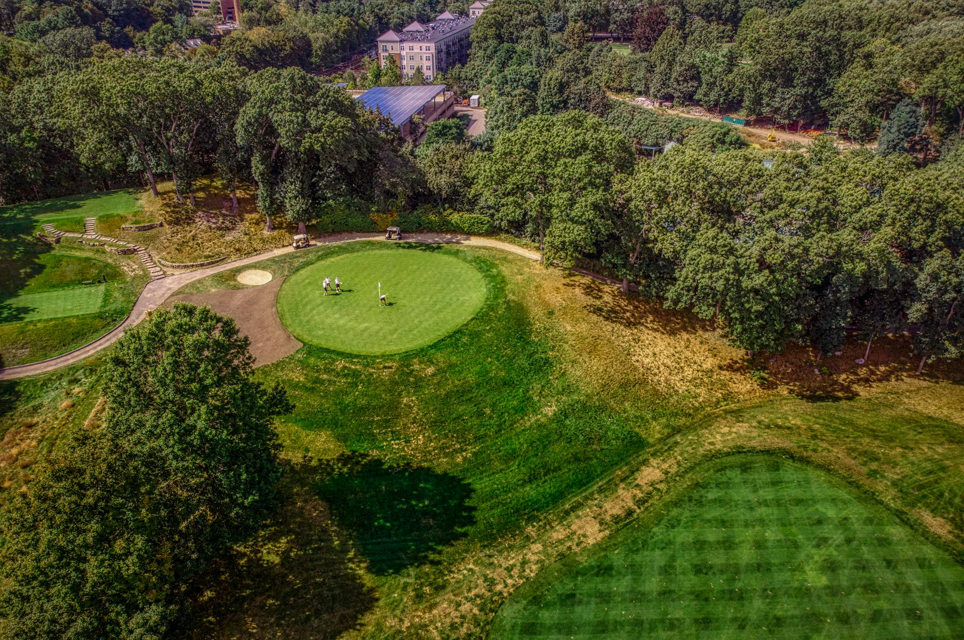 Aerial View of People Playing Golf on a Golf Course