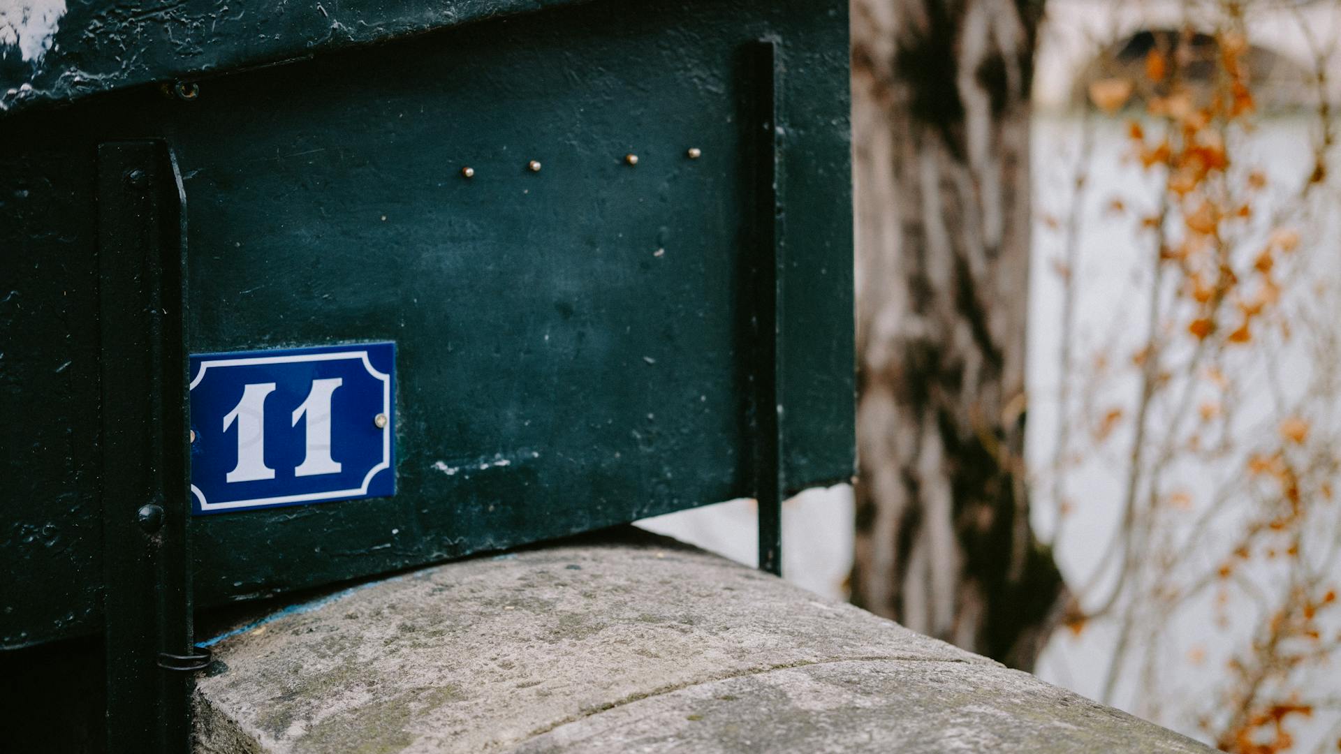 Close-up of a Mailbox and a street number