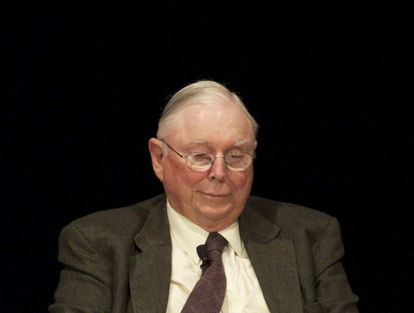 Portrait Photo of The American businessman Charles Thomas Munger in gray suit