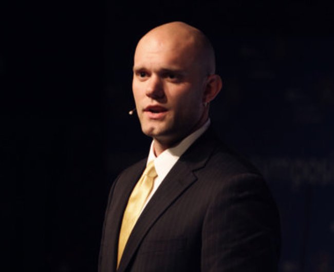 James Clear giving a speech