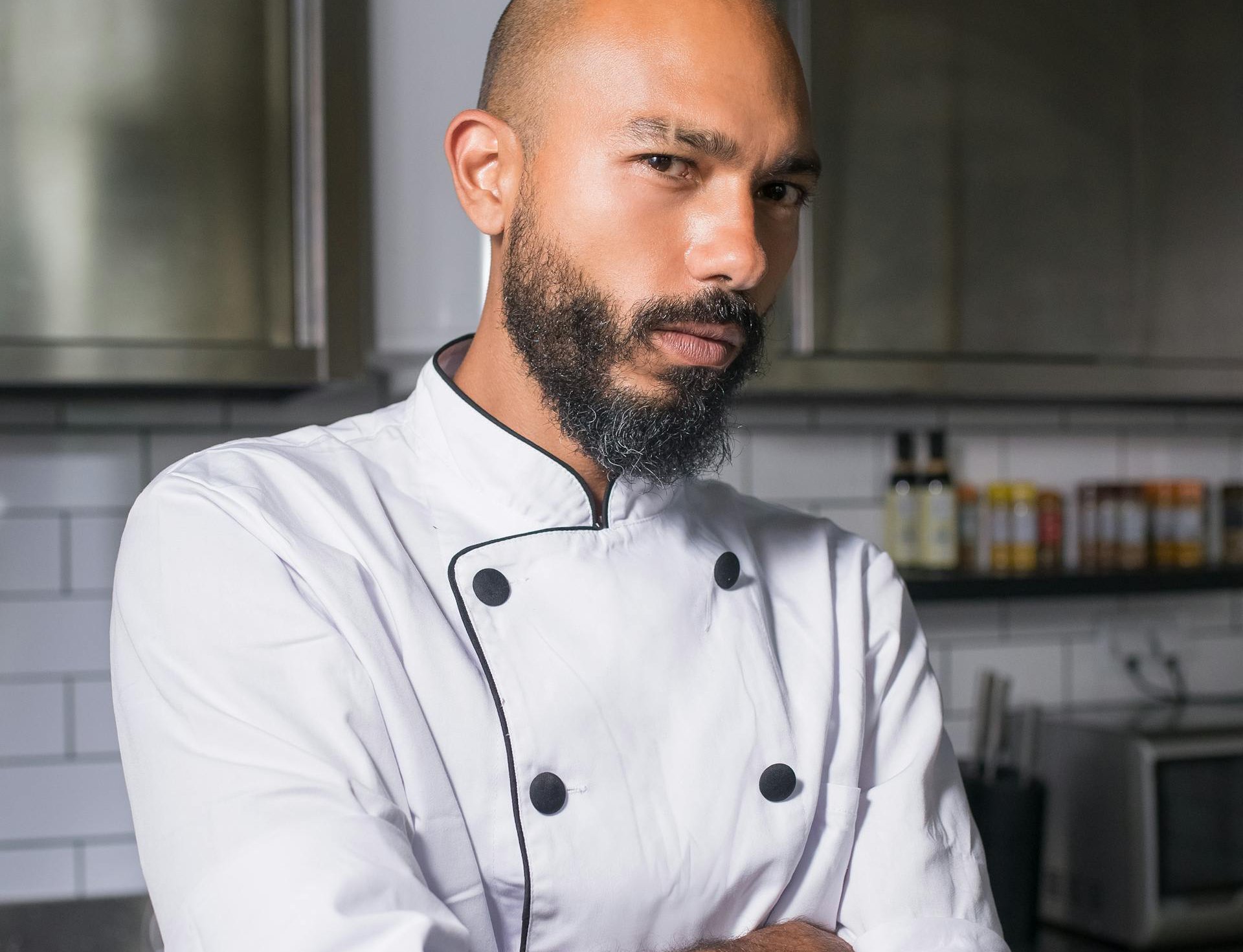 A Man in Chef's White Standing