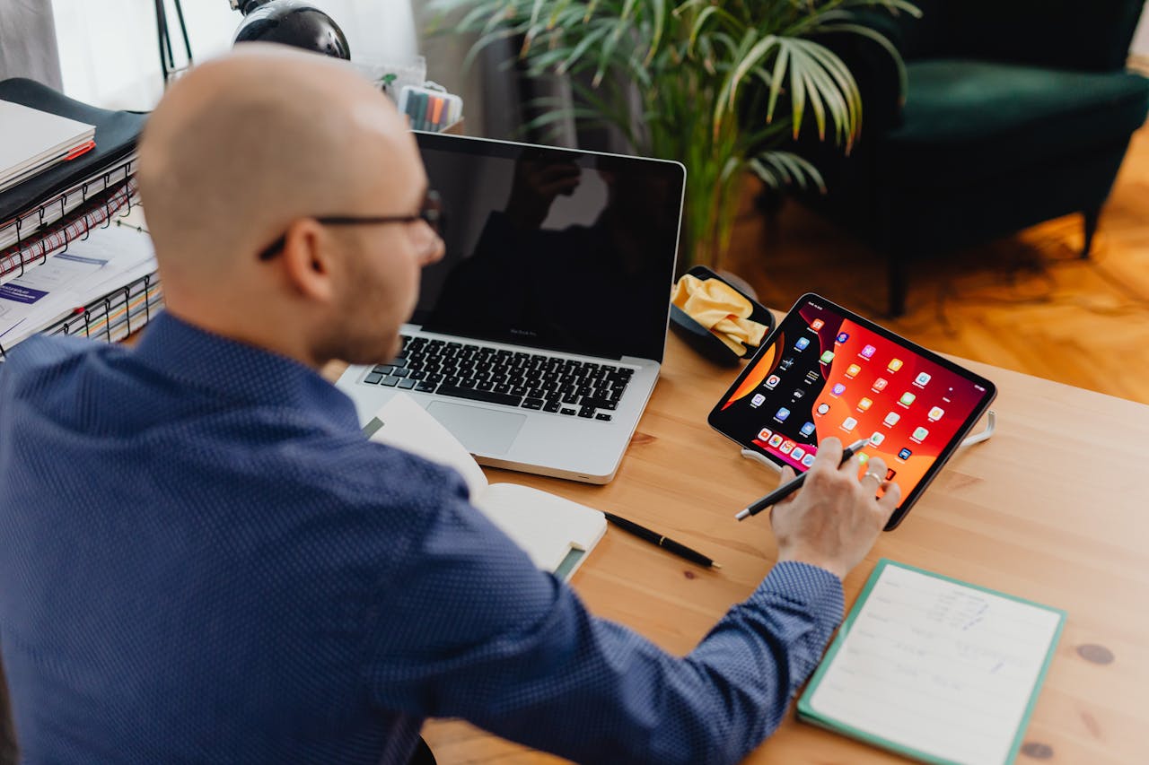A Man Using a Digital Tablet