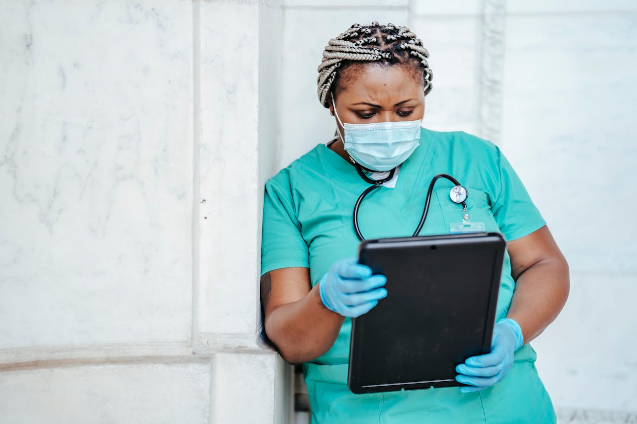 Focused woman in a uniform with documents