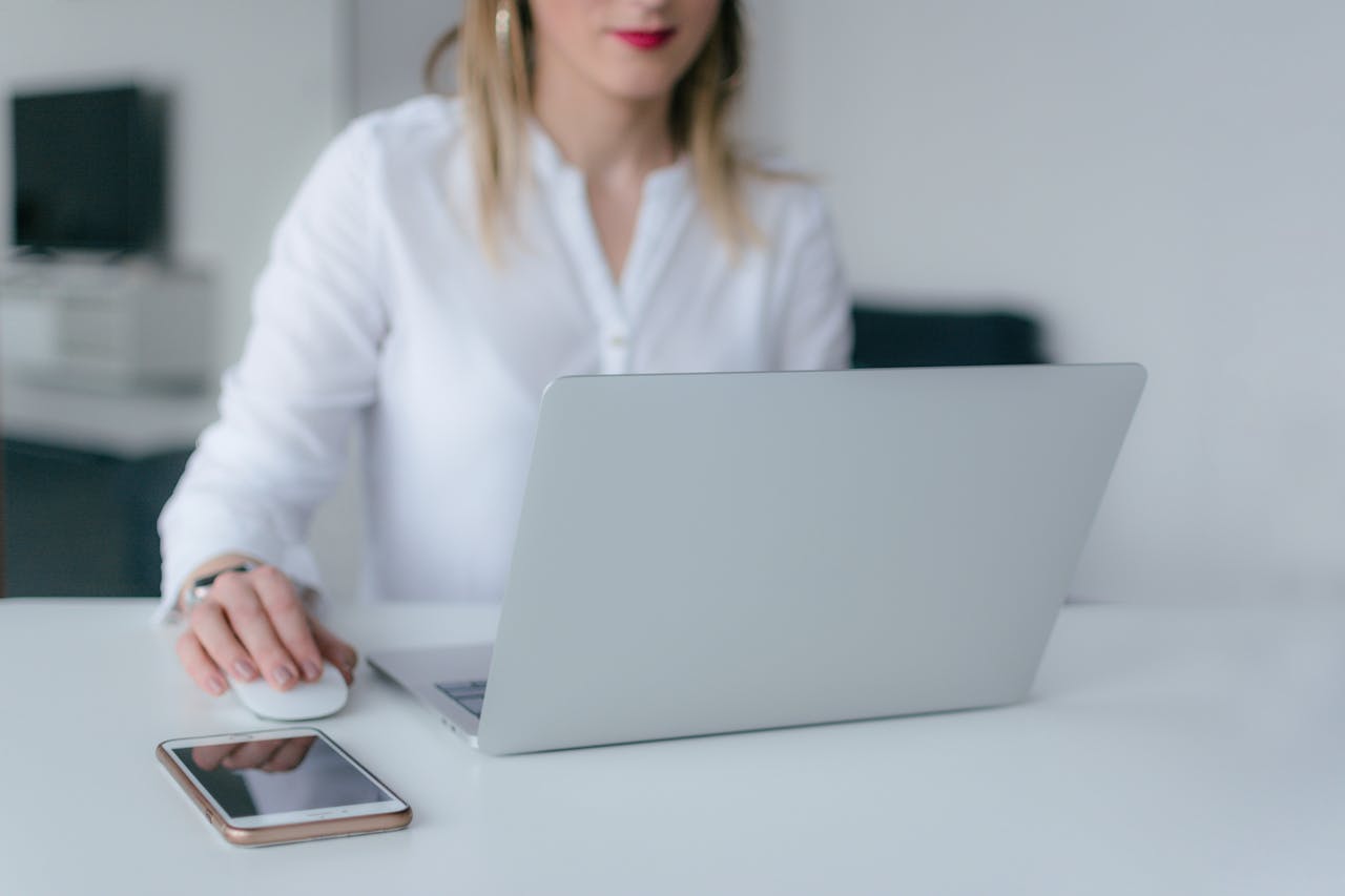 Woman Sitting on a Desk