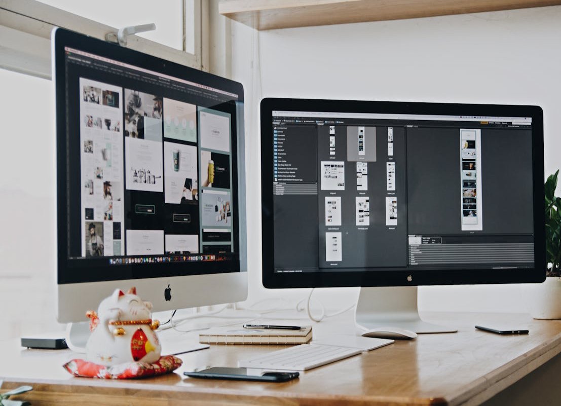 Silver and Black Imac's
