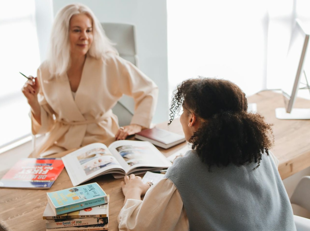 Teacher Discussing Her Lesson With Her Student