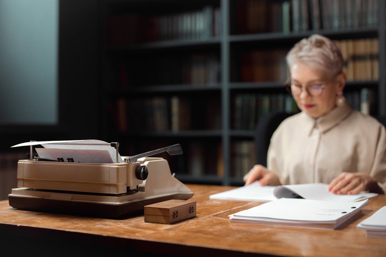 Elderly Woman reading a text.