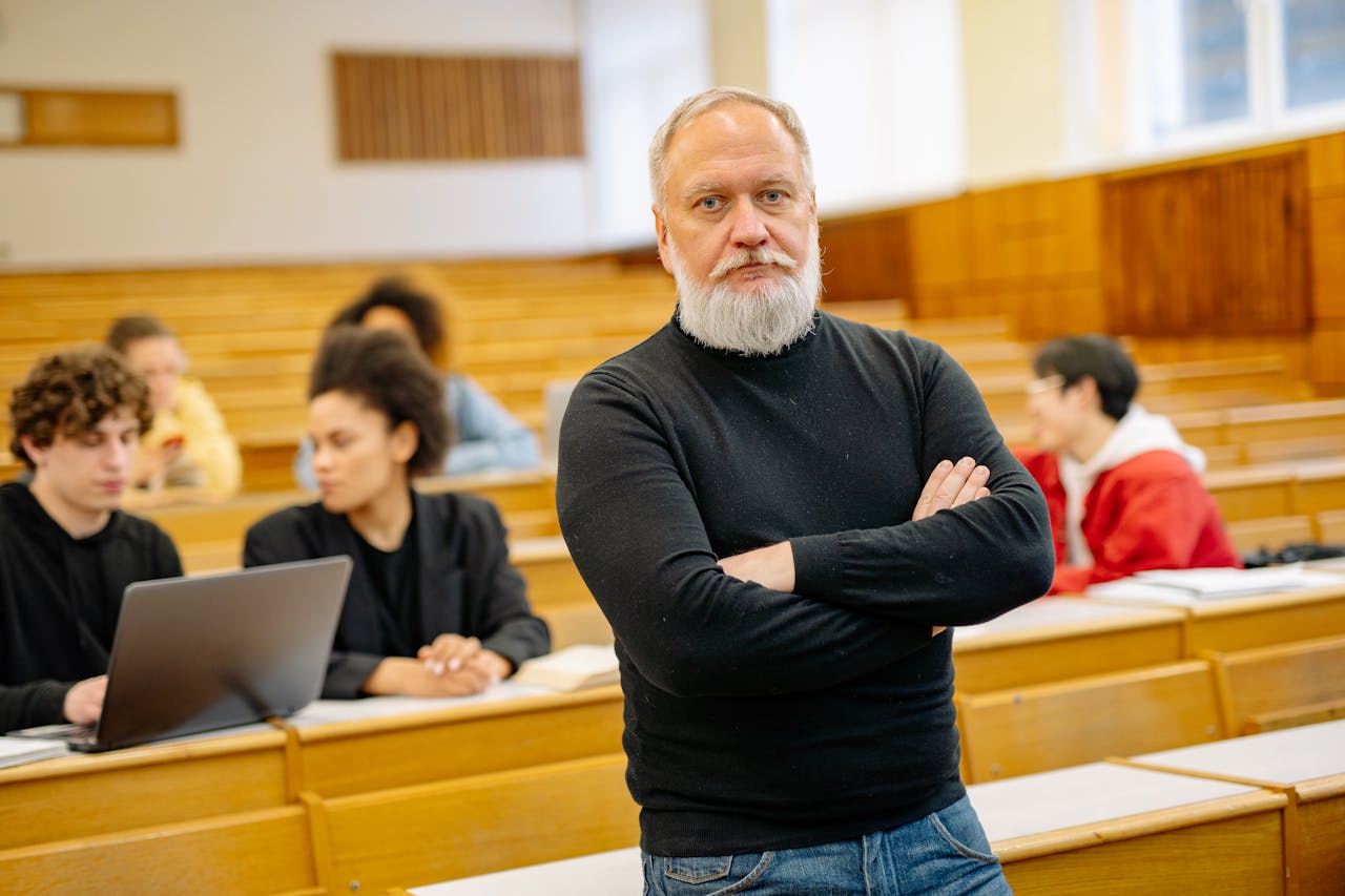 Professor Standing in a Lecture Hall