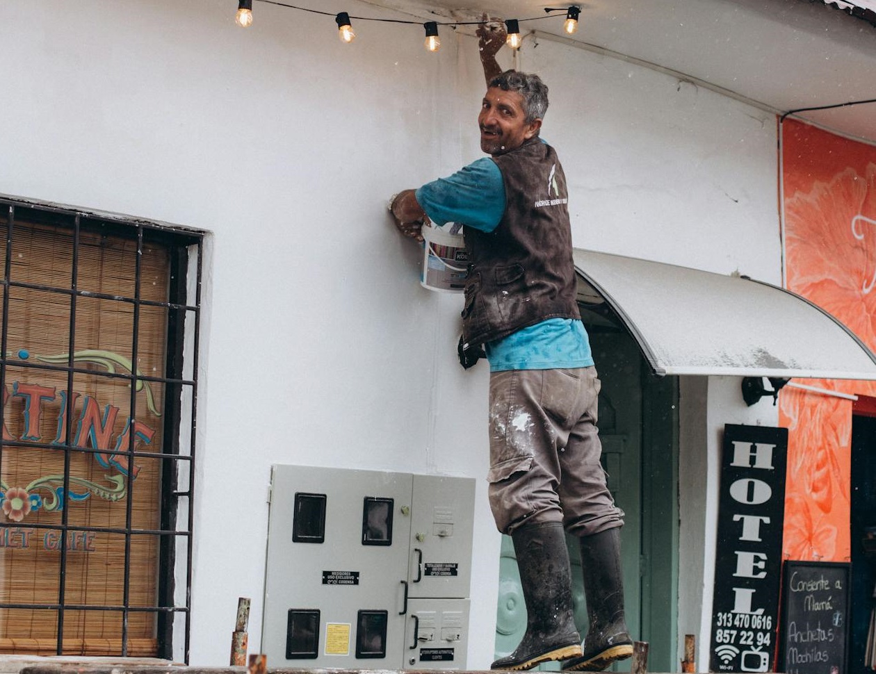 Man Painting the Wall