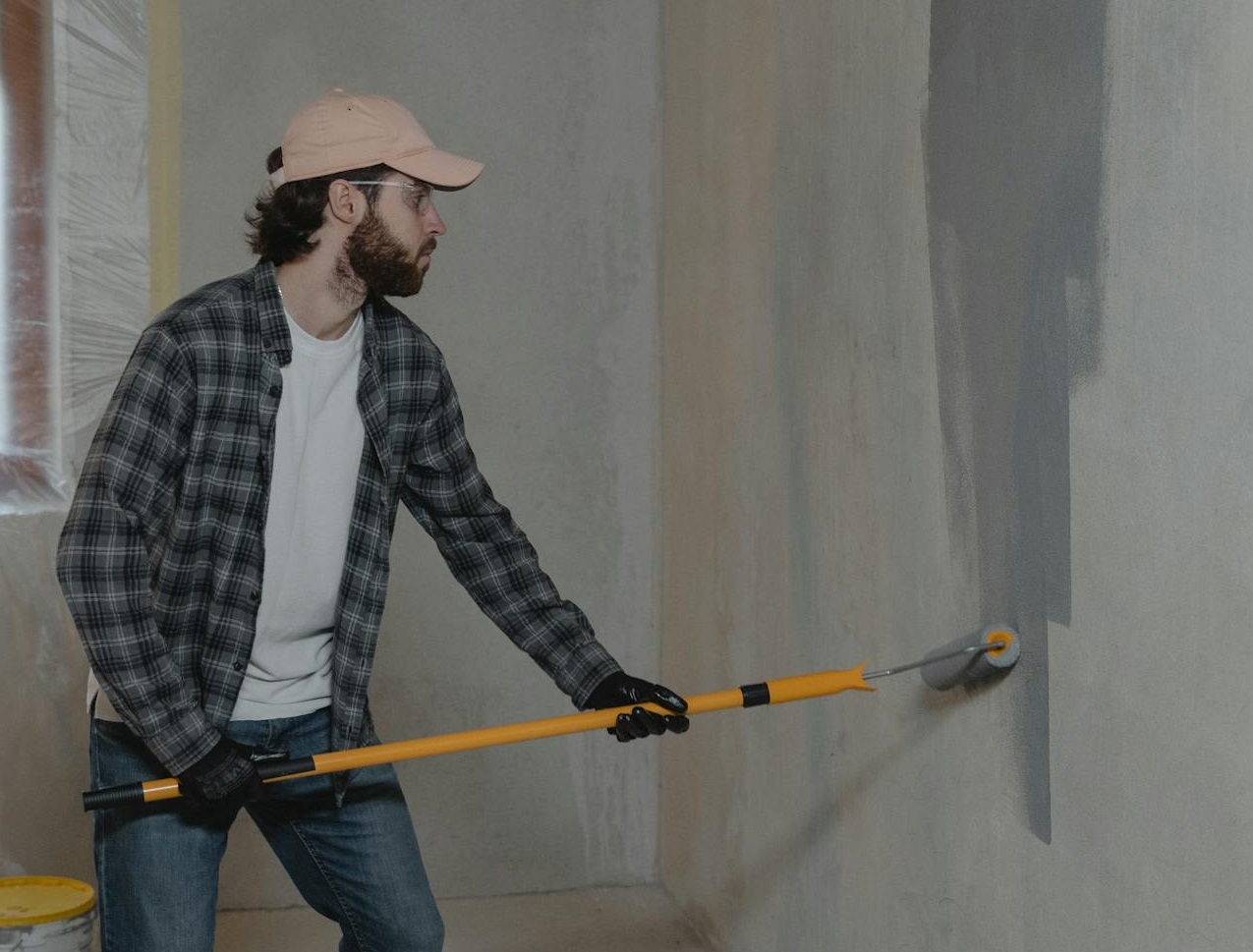 Man Painting the Wall