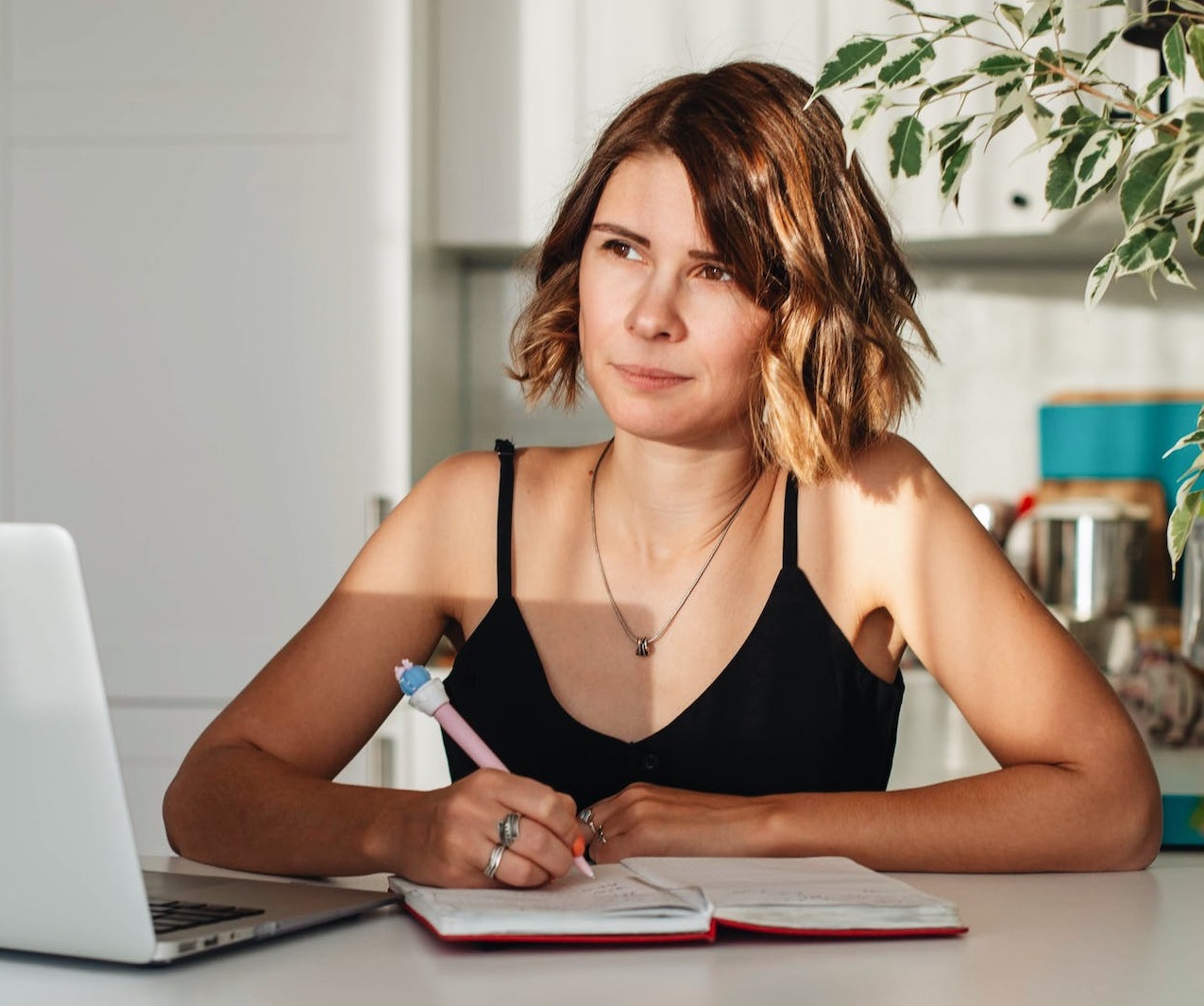 Woman working at her desk.