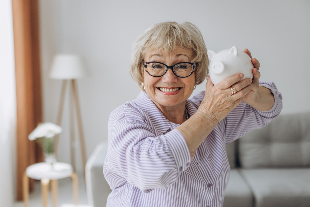 senior woman saving money