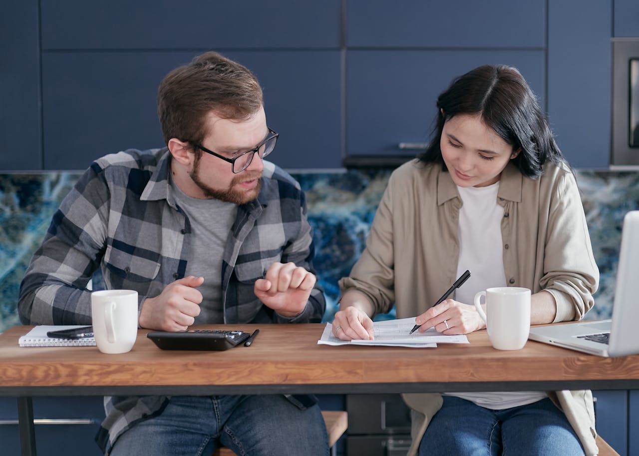 Couple are looking at bills.