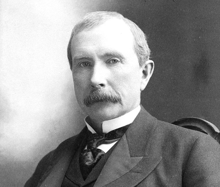 Grayscale Portrait Photo of 56 year old John D. Rockefeller.