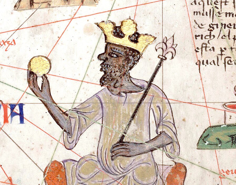 Detail showing Mansa Musa sitting on a throne and holding a gold coin