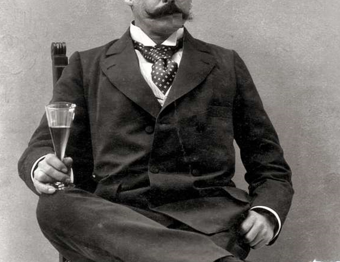 Man drinking wine at party - 1880