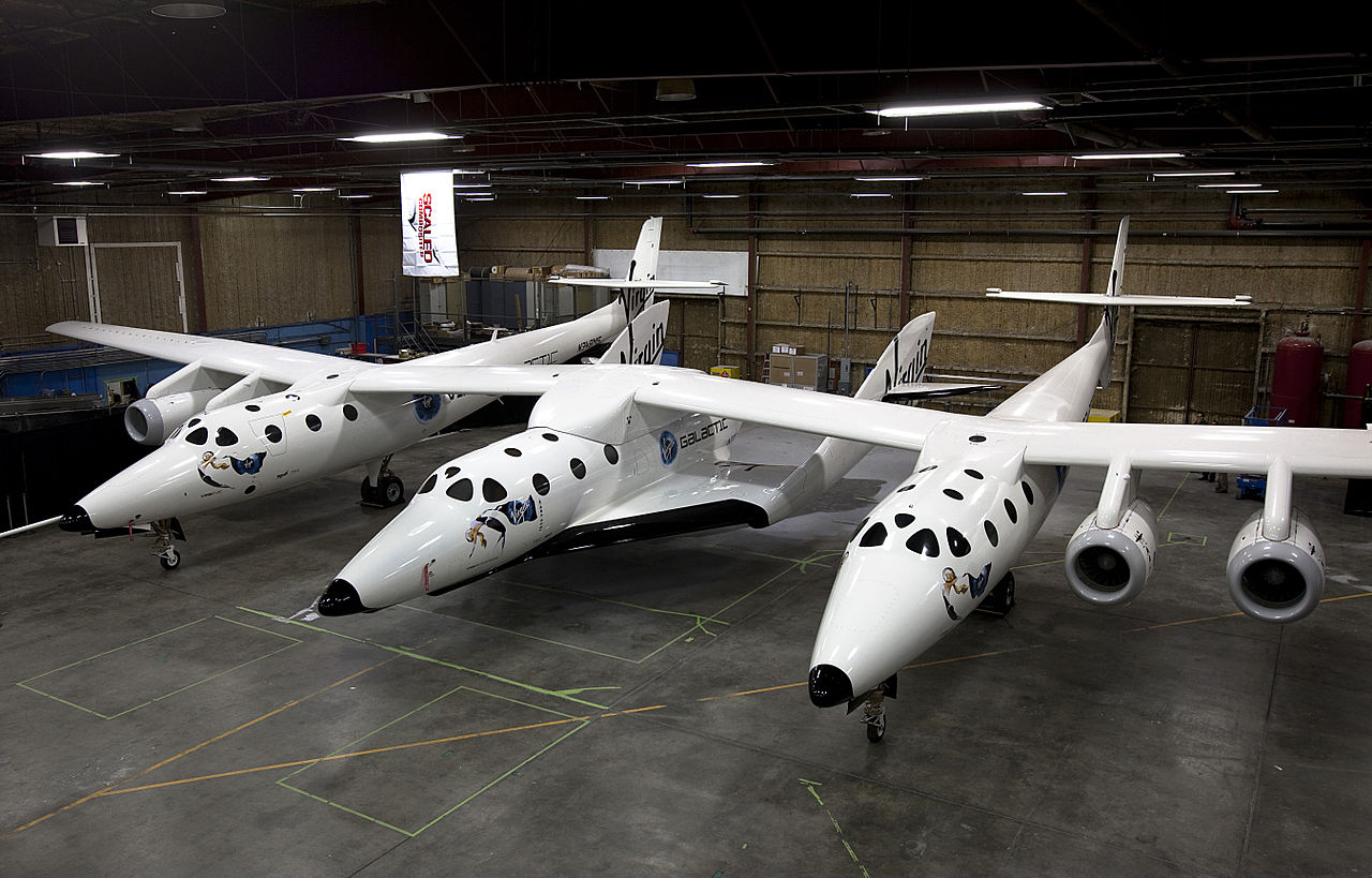 The Scaled Composites SpaceShipTwo spaceplane (central fuselage) resting under its mothership - 2009