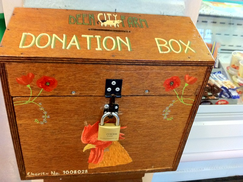 Close-up Photo of wooden donation box