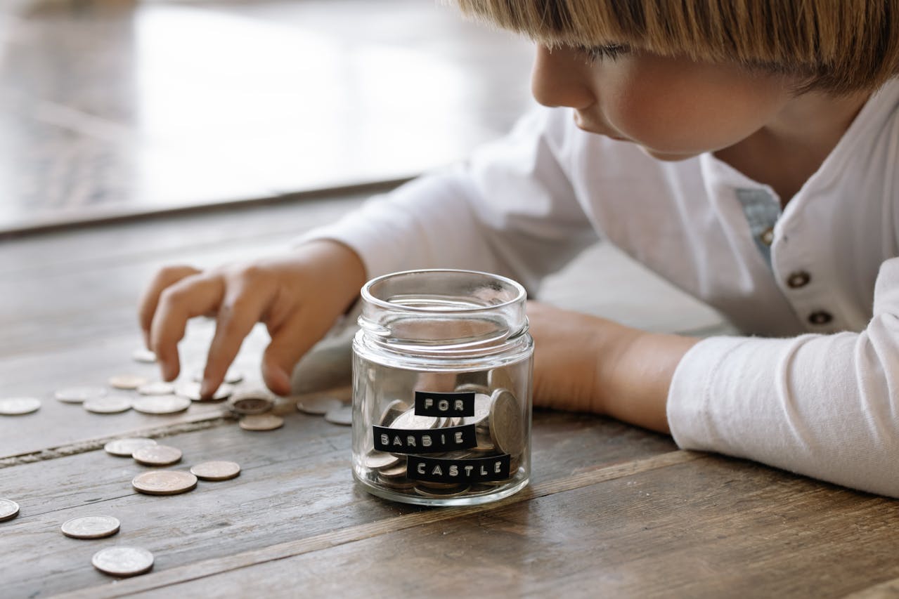 Child calculating money