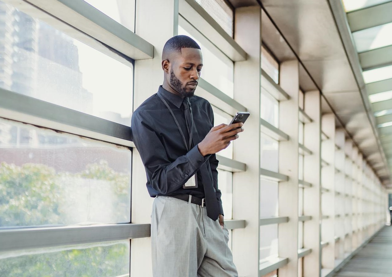 A Man Using his Smart Phone