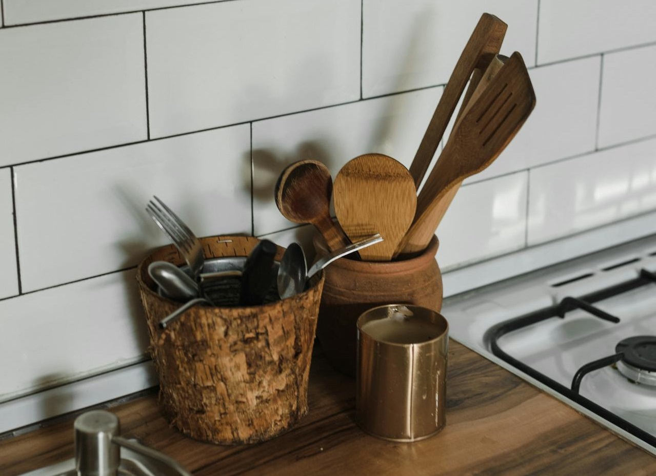 Brown Wooden Spoons in Brown Wooden Bowl in the kitchen.